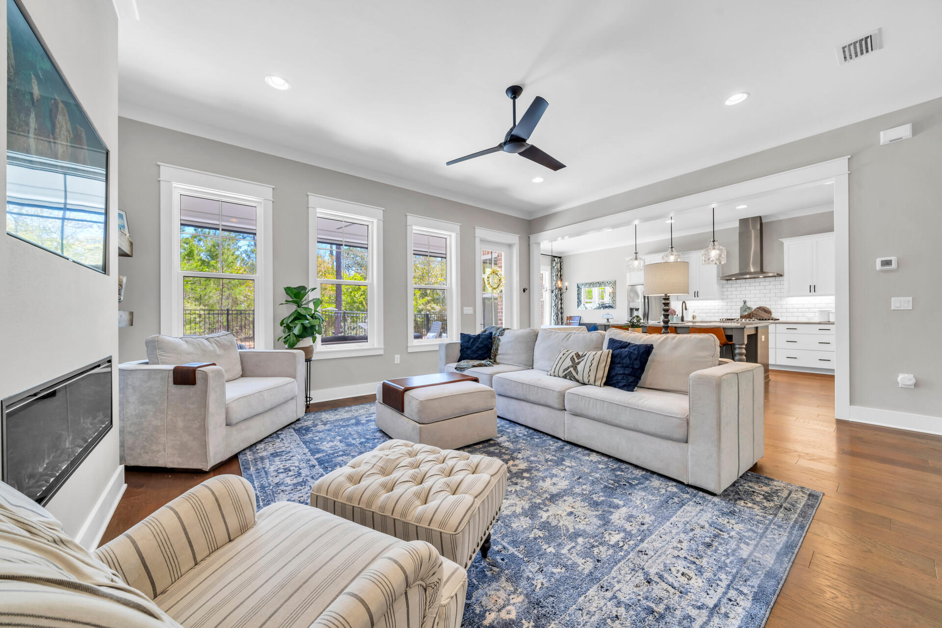 1244 Elderflower Drive Niceville, FL 32578 - Photo 28 of 74 a living room with furniture and a large window