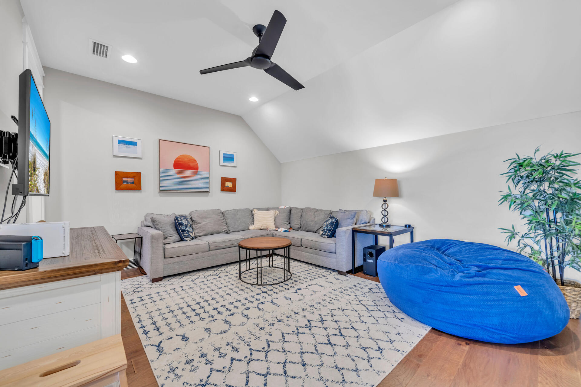 1244 Elderflower Drive Niceville, FL 32578 - Photo 44 of 74 a living room with furniture and a potted plant