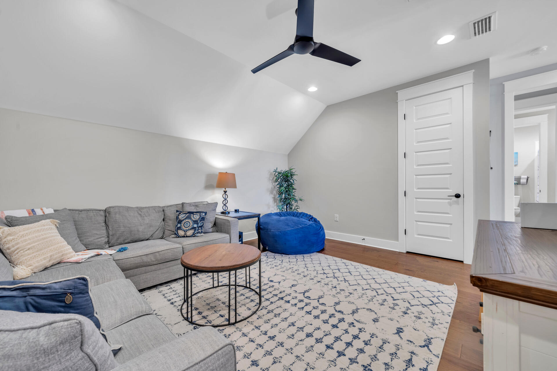1244 Elderflower Drive Niceville, FL 32578 - Photo 45 of 74 a living room with furniture and wooden floor