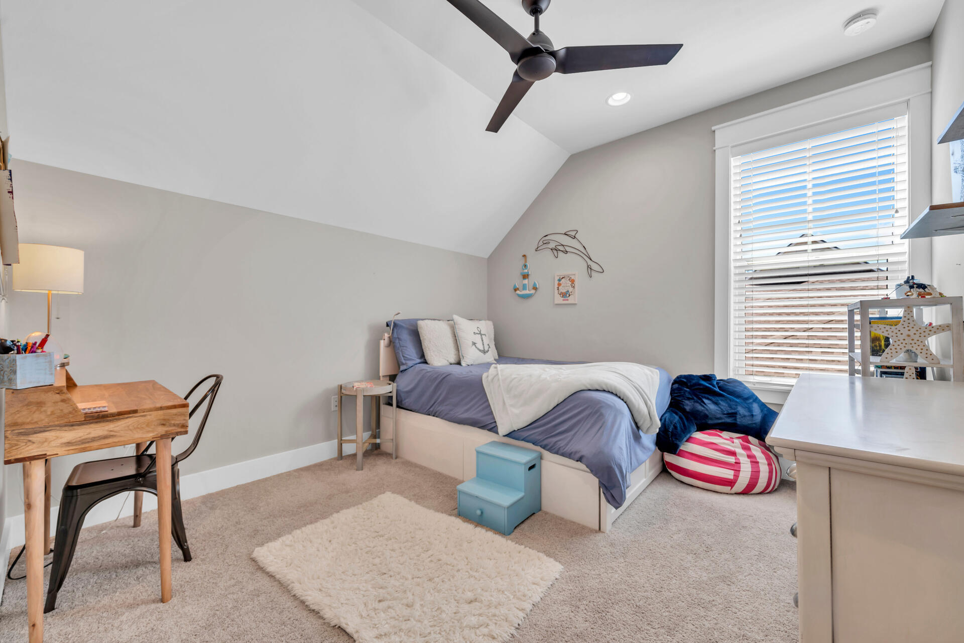 1244 Elderflower Drive Niceville, FL 32578 - Photo 51 of 74 a bedroom with furniture and a window