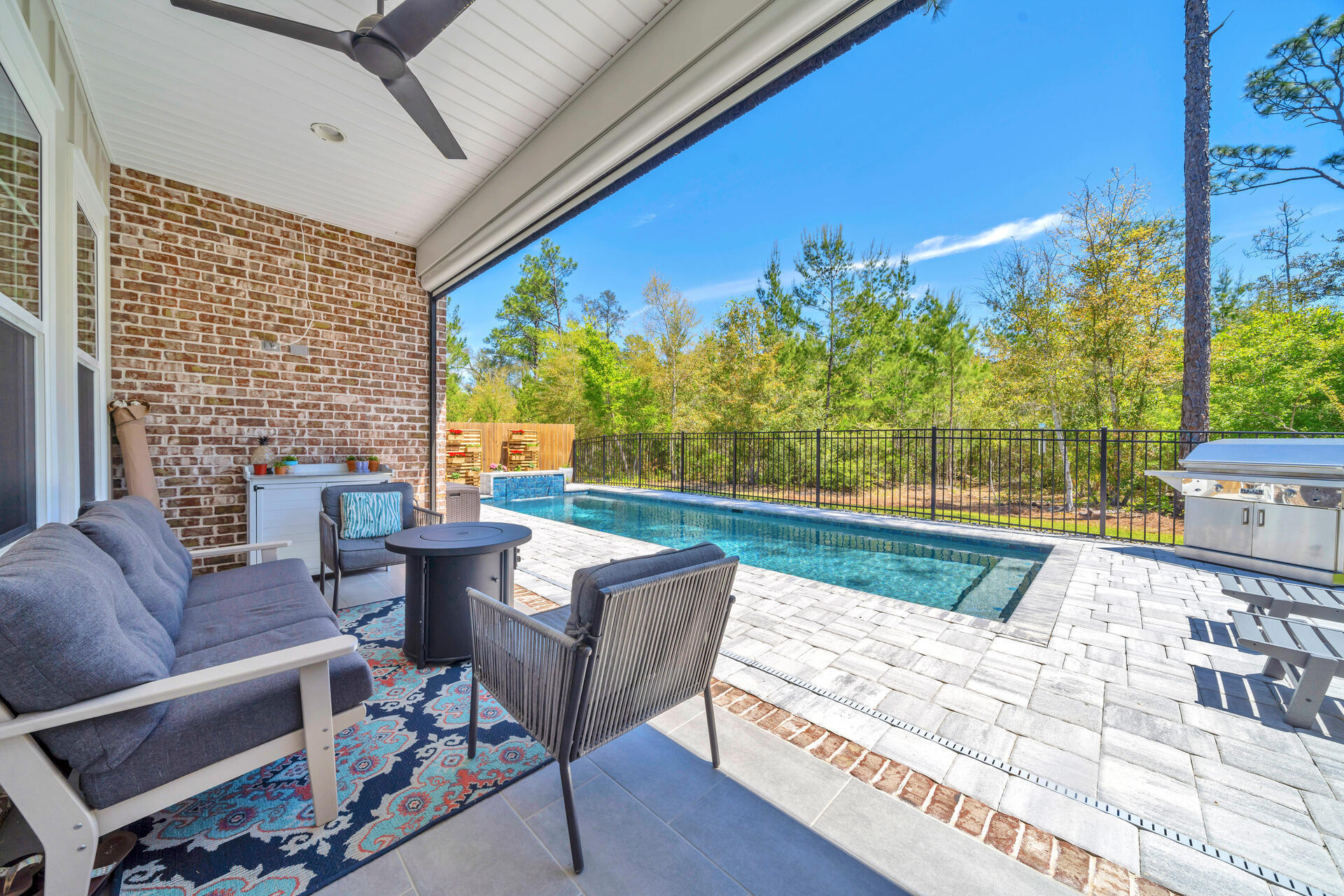 1244 Elderflower Drive Niceville, FL 32578 - Photo 56 of 74 a view of an outdoor sitting area with furniture