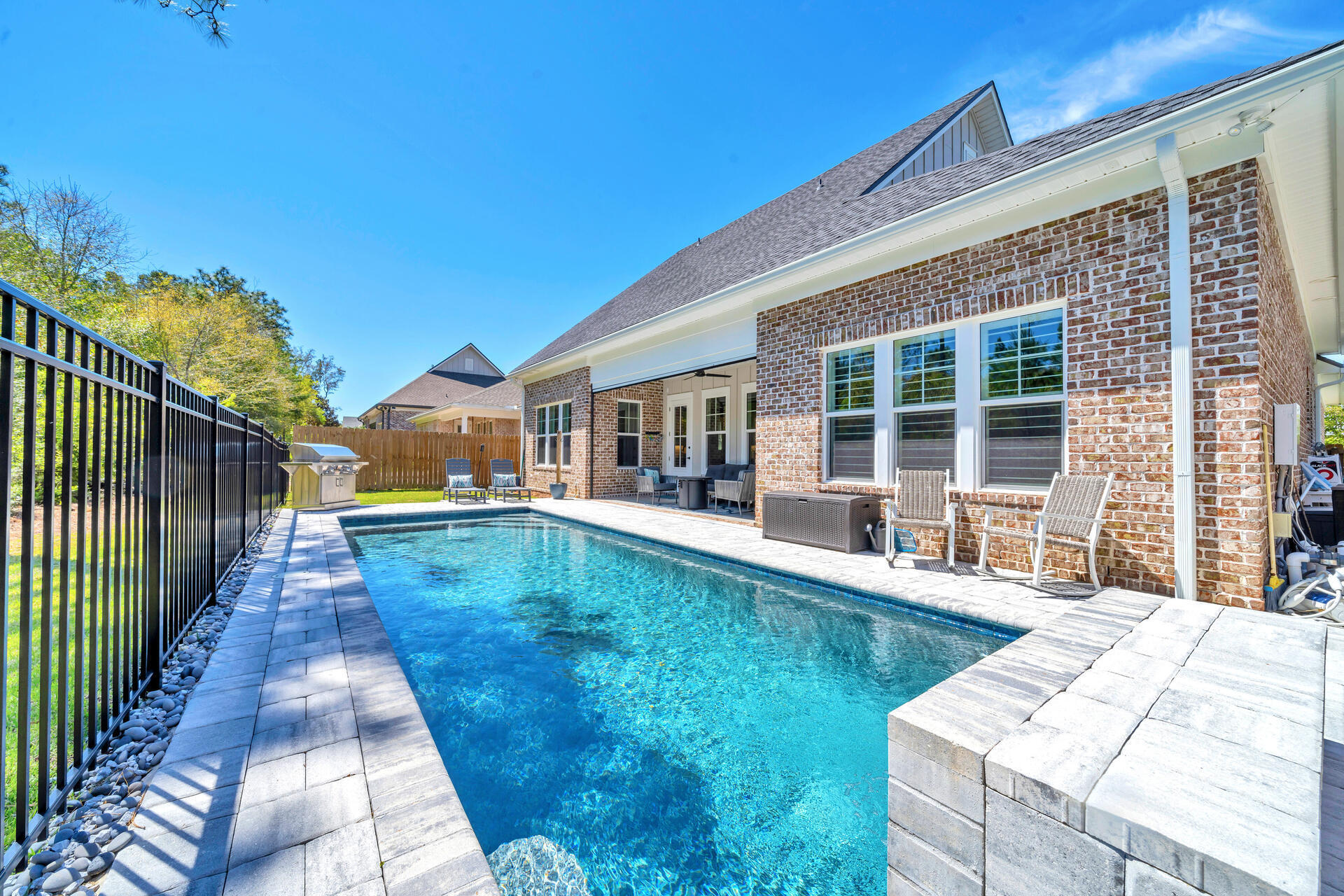 1244 Elderflower Drive Niceville, FL 32578 - Photo 62 of 74 a view of a house with a swimming pool