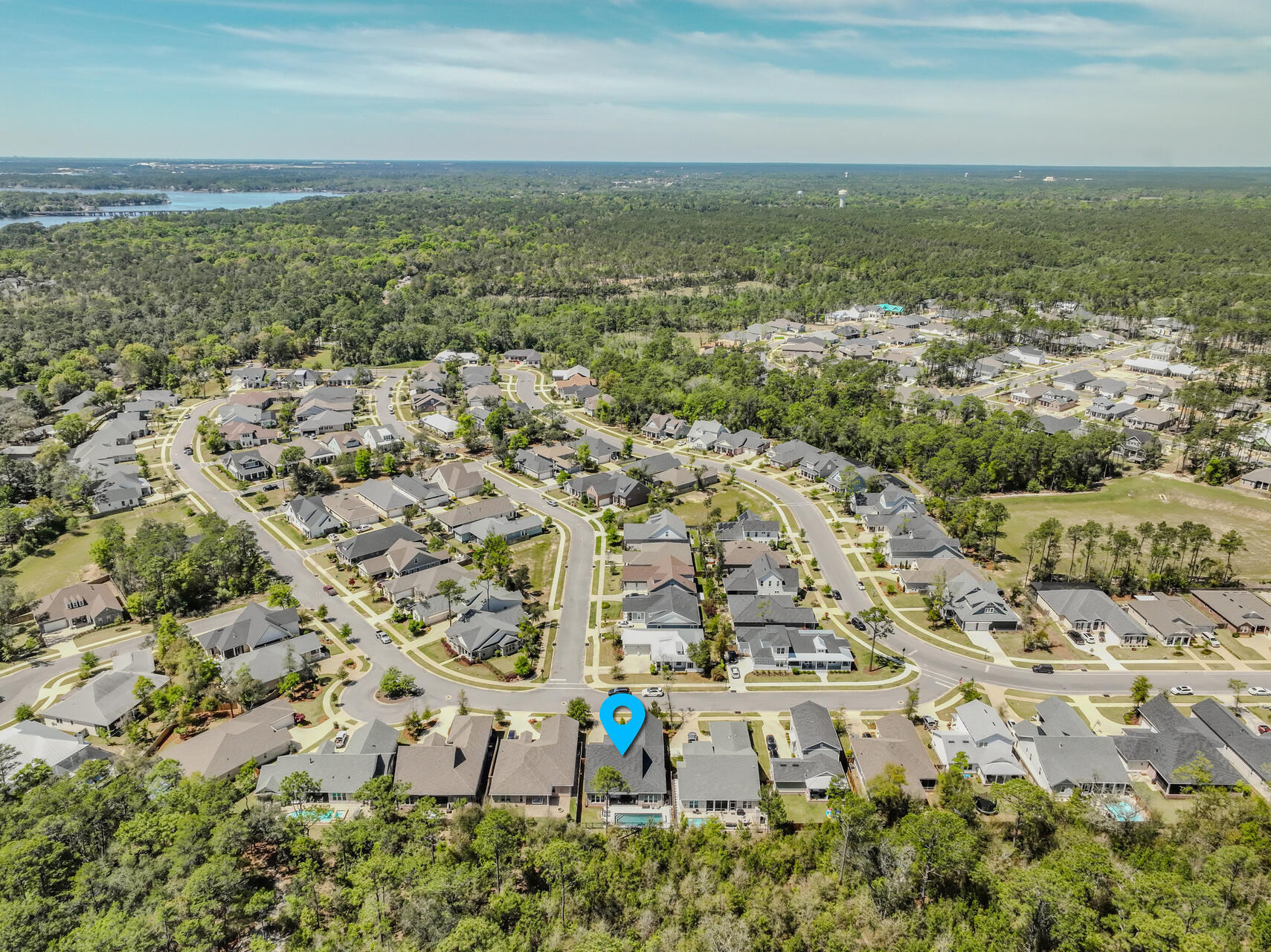 1244 Elderflower Drive Niceville, FL 32578 - Photo 70 of 74 an aerial view of a city with lots of residential buildings