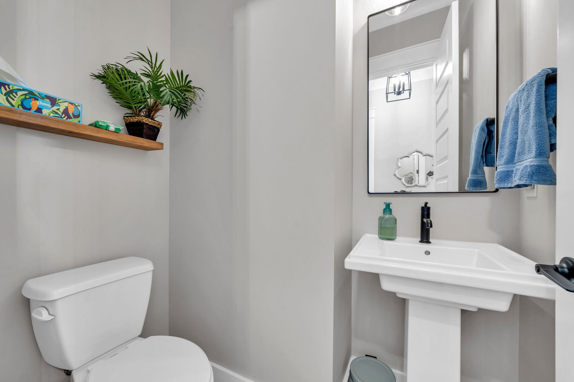 1244 Elderflower Drive Niceville, FL 32578 - Photo 10 of 74 a bathroom with a toilet a sink and mirror