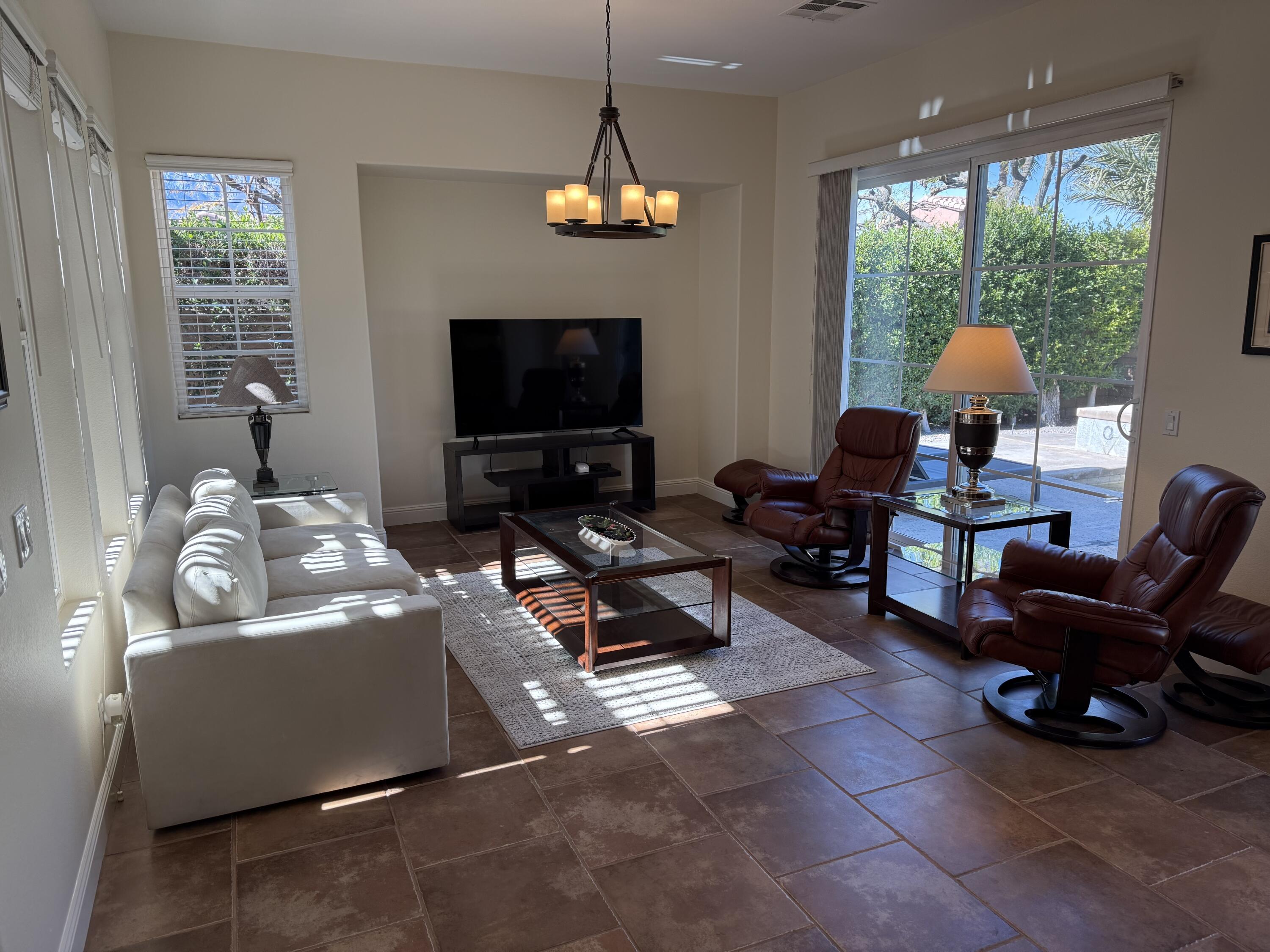 2 Via Santa Elena Rancho Mirage, CA 92270 - Photo 14 of 51 a living room with furniture and a flat screen tv