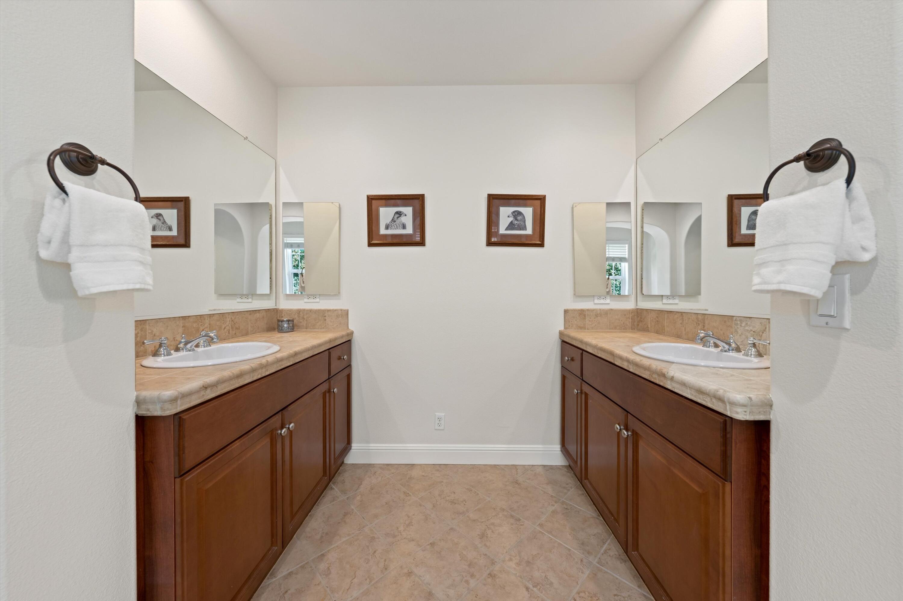 2 Via Santa Elena Rancho Mirage, CA 92270 - Photo 23 of 51 a utility room with cabinets washer and dryer