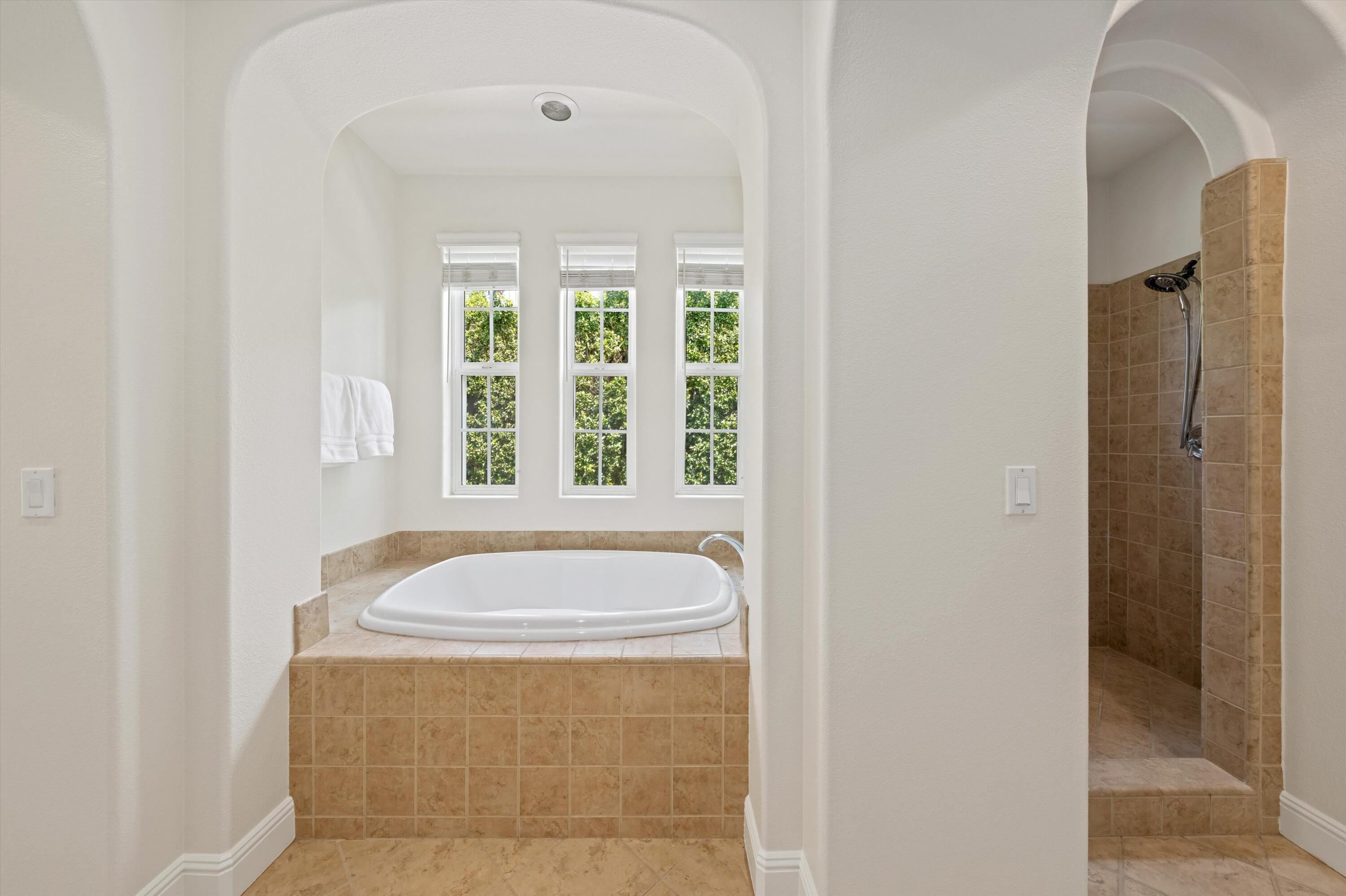 2 Via Santa Elena Rancho Mirage, CA 92270 - Photo 24 of 51 a bathroom with a bathtub and shower