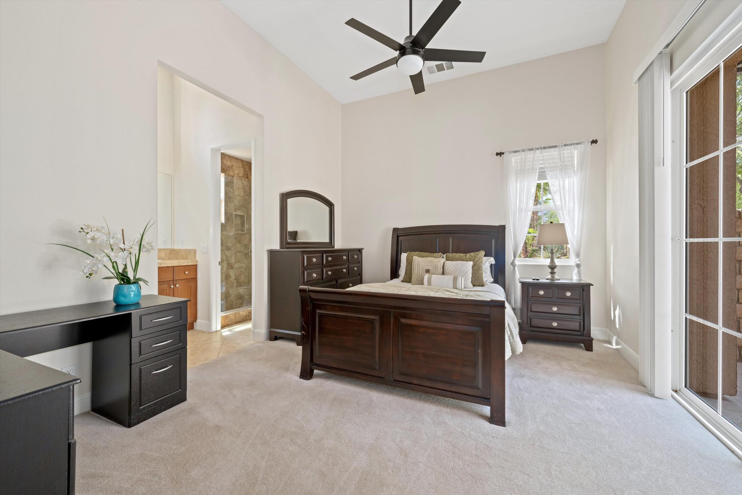 2 Via Santa Elena Rancho Mirage, CA 92270 - Photo 25 of 51 a living room with furniture and a chandelier