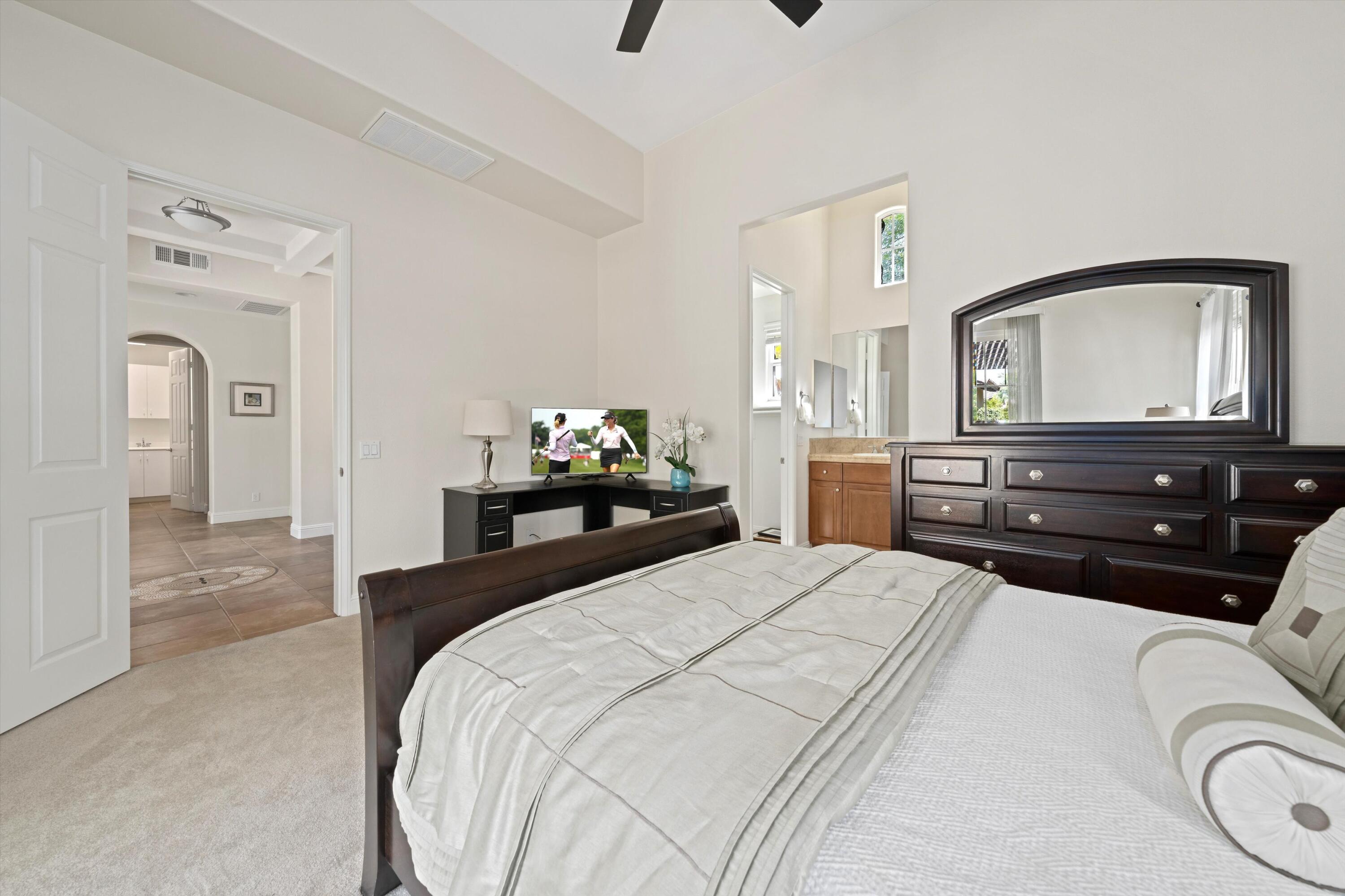 2 Via Santa Elena Rancho Mirage, CA 92270 - Photo 26 of 51 a bedroom with a bed and a dresser