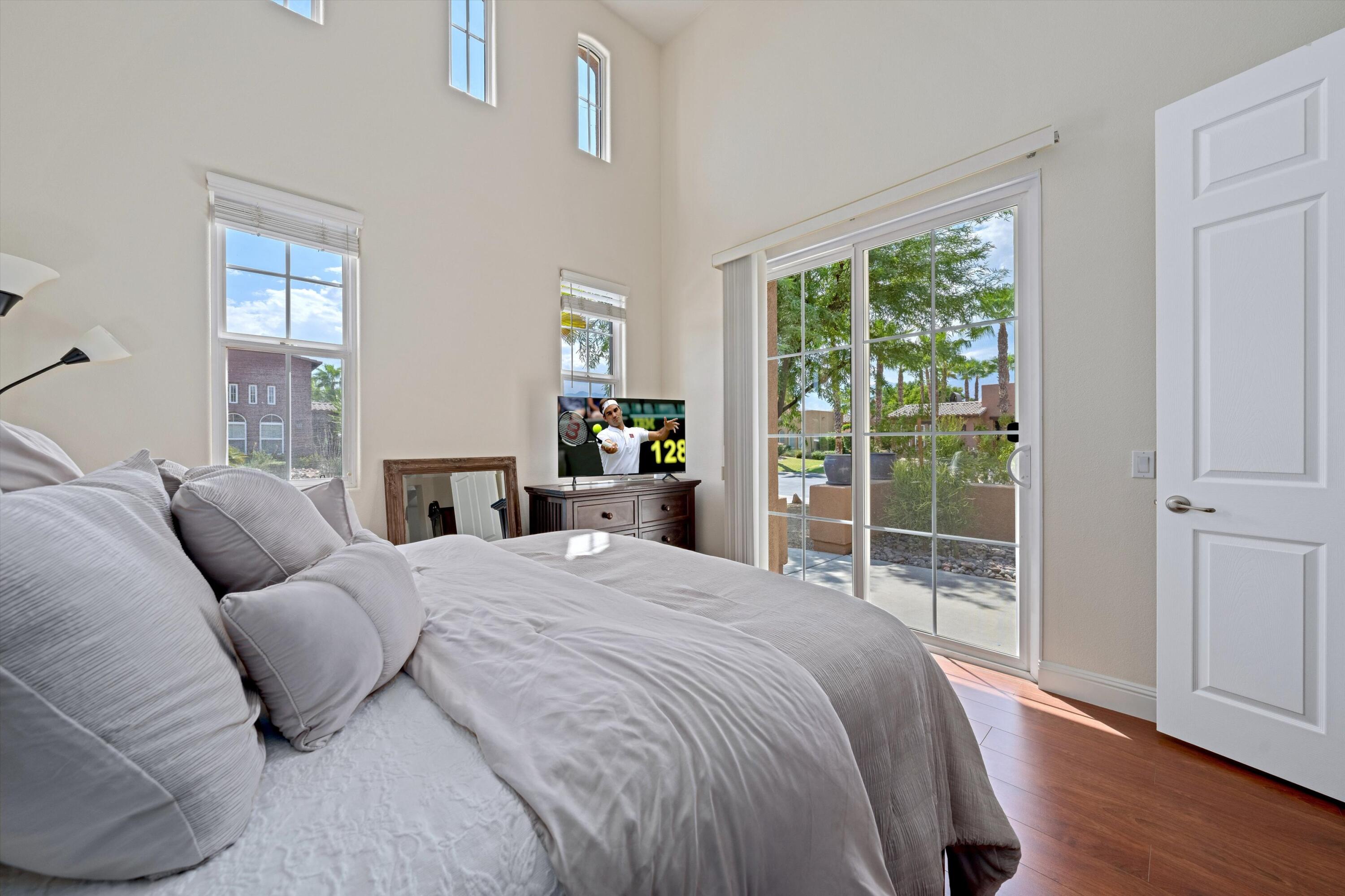 2 Via Santa Elena Rancho Mirage, CA 92270 - Photo 29 of 51 a bedroom with a large bed and a window