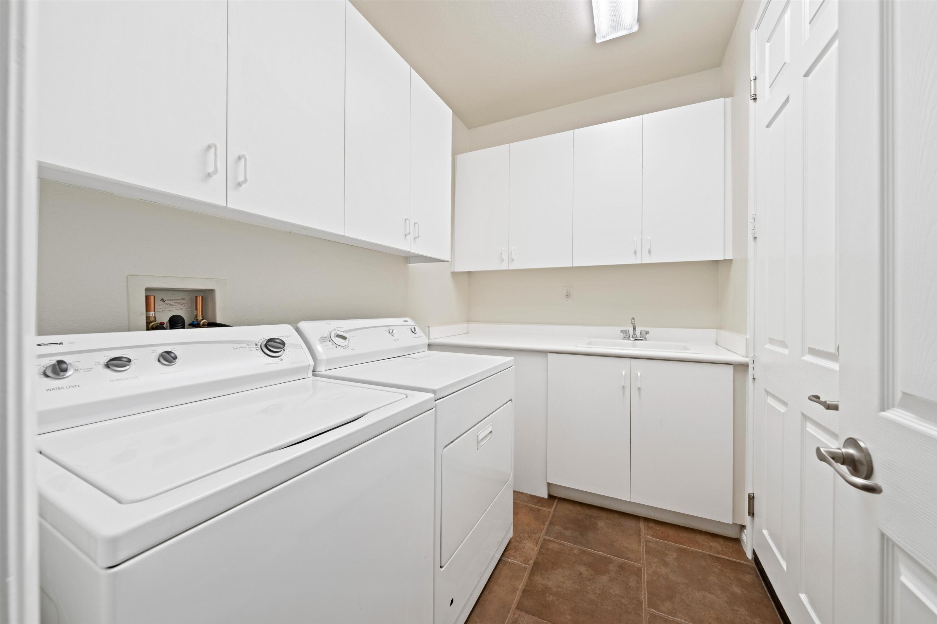 2 Via Santa Elena Rancho Mirage, CA 92270 - Photo 31 of 51 a utility room with dryer and washer