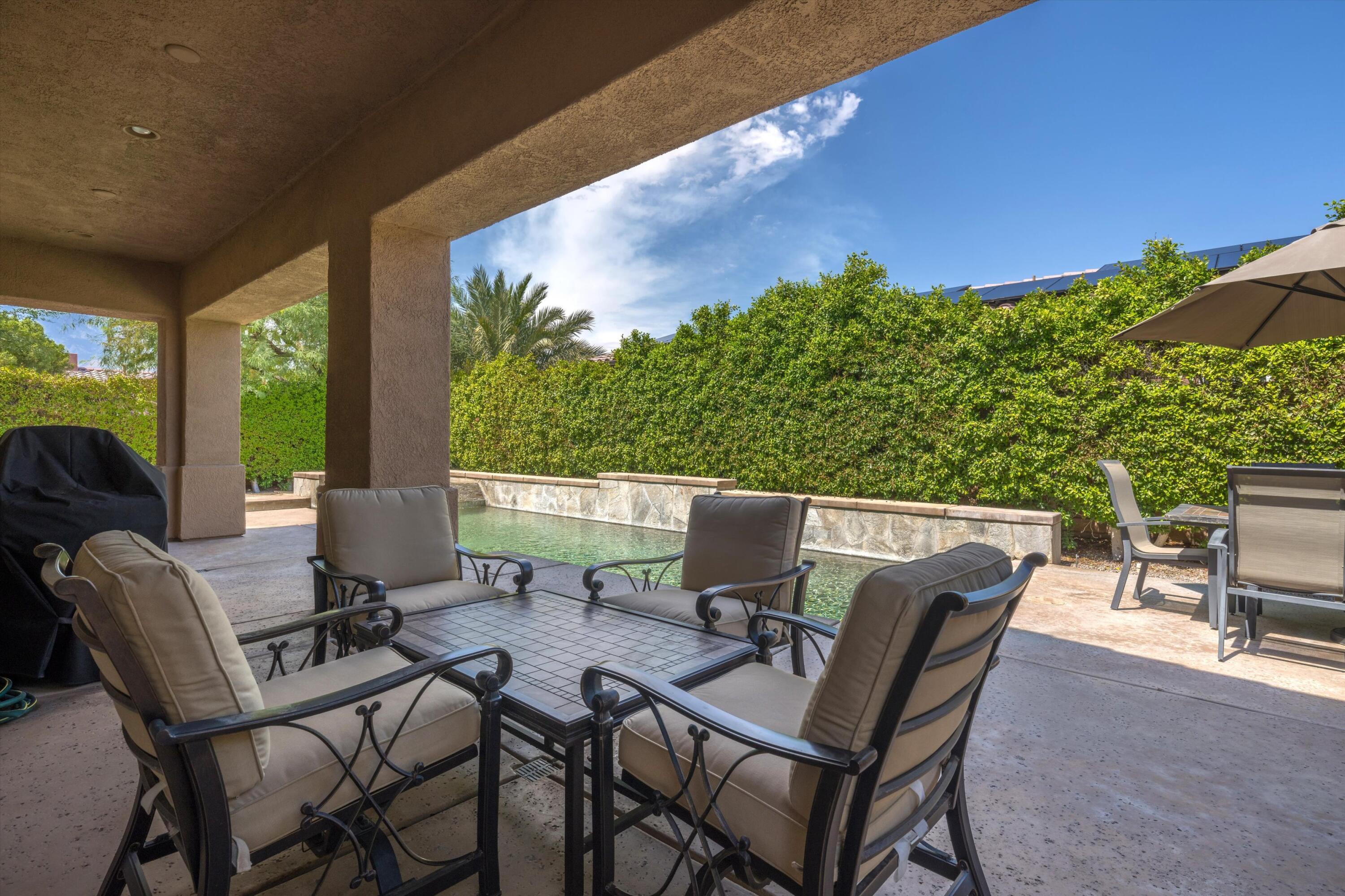 2 Via Santa Elena Rancho Mirage, CA 92270 - Photo 39 of 51 a view of an outdoor dining space with furniture and garden