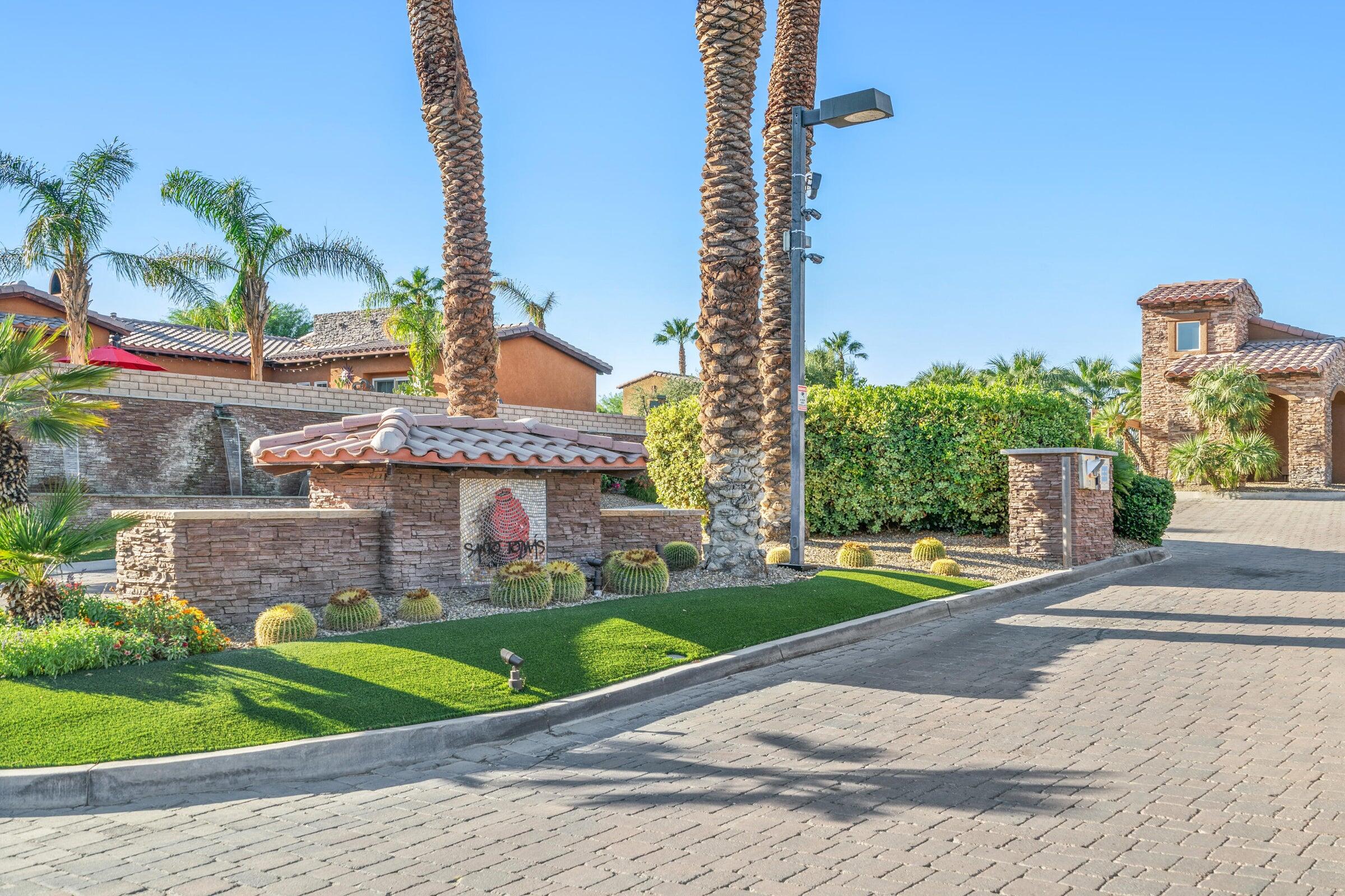 2 Via Santa Elena Rancho Mirage, CA 92270 - Photo 43 of 51 a front view of a house with a garden and plants