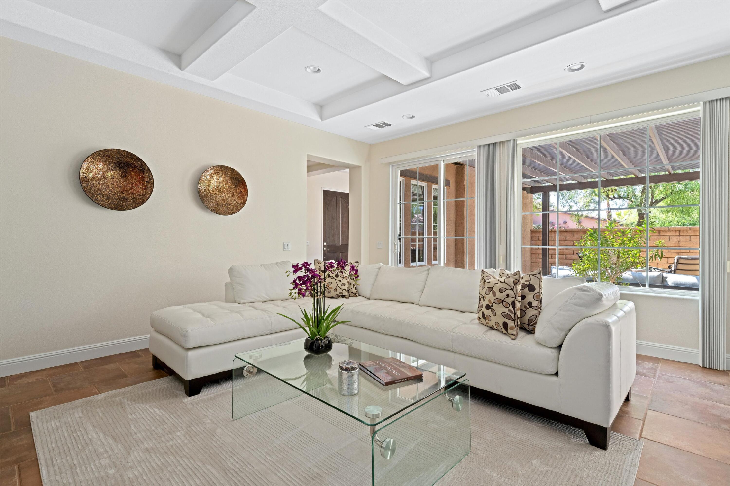 2 Via Santa Elena Rancho Mirage, CA 92270 - Photo 9 of 51 a living room with furniture and a large window