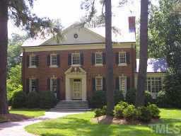 1620 Oberlin Road Raleigh, NC 27608 - Photo 1 of 10 a front view of a house with a yard