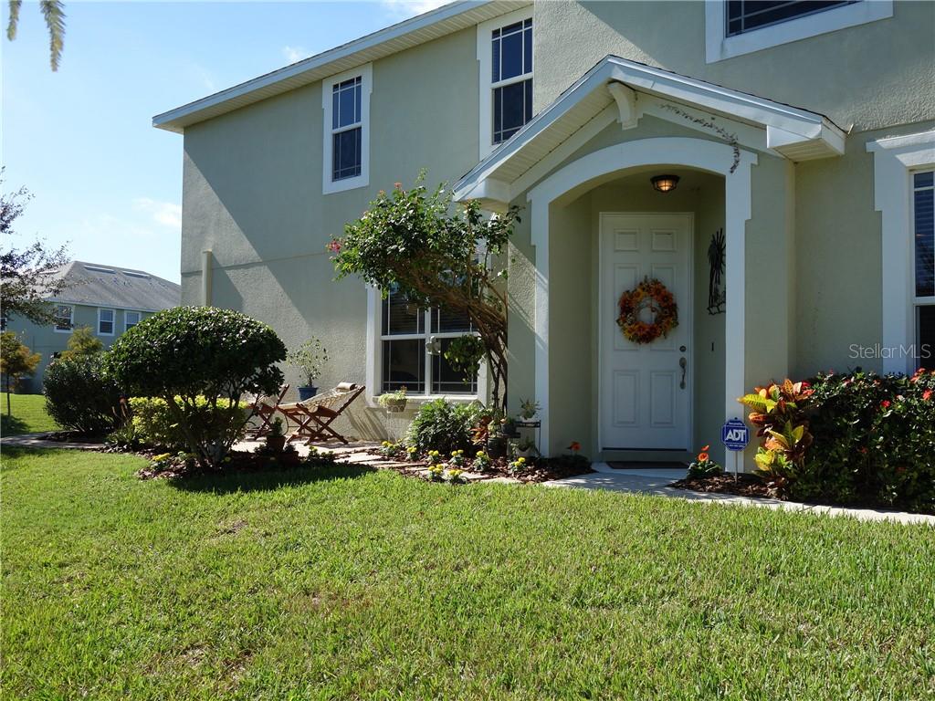 316 Harbor Ridge Drive Palm Harbor, FL 34683 - Photo 1 of 1 a front view of a house with a garden