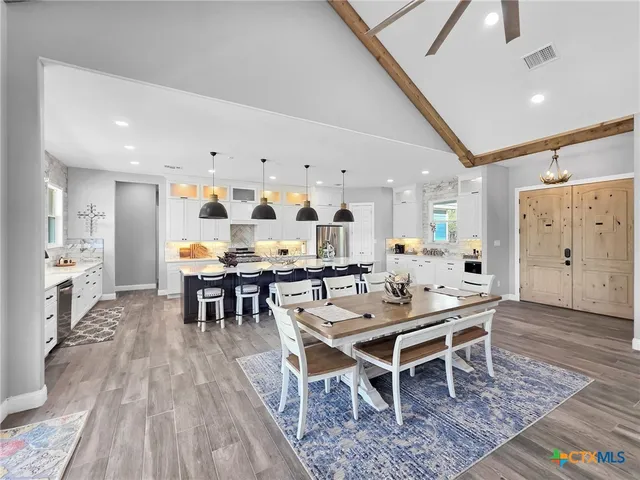 a view of a dining room with furniture