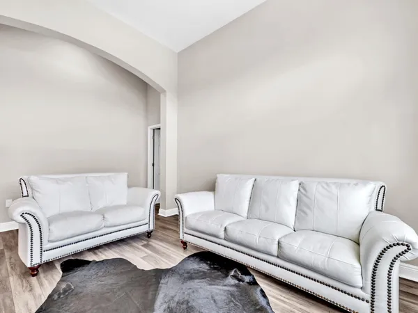 a living room with a couch and a couch