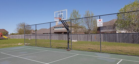 20724 Kearney Hill Road Pflugerville, TX 78660 - Photo 39 of 40 Multi-sport court with painted lines and a basketball hoop