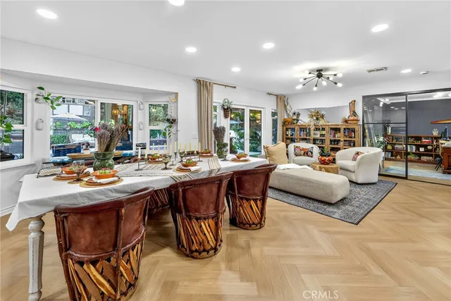 a kitchen with stainless steel appliances granite countertop a refrigerator stove microwave and sink