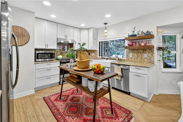 a work room with furniture and a window