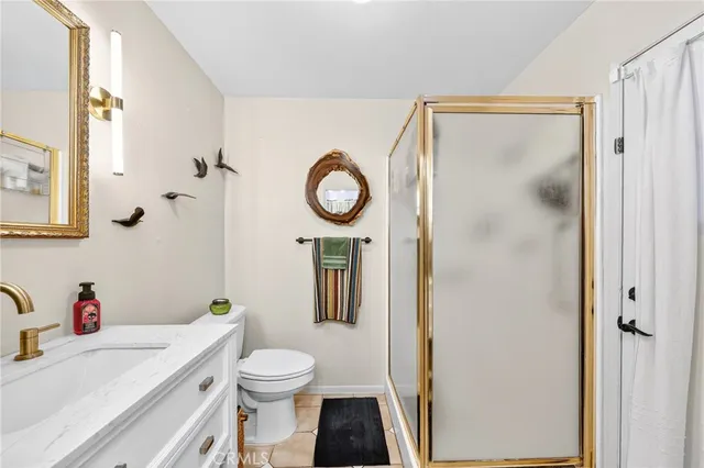 a room with furniture a rug and a book shelf