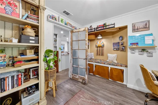 a view of a house with backyard sitting area and swimming pool