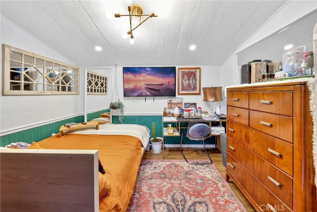 a view of a backyard with sitting area