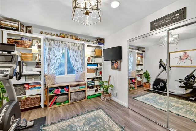 a view of a backyard with a sitting area