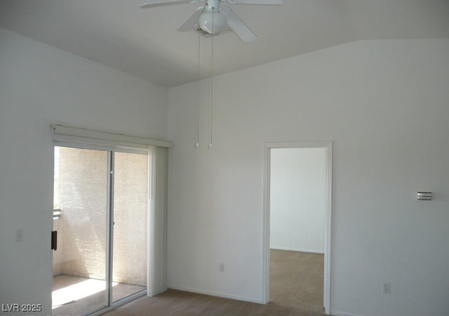 8725 West Flamingo Road, Unit 226 Las Vegas, NV 89147 - Photo 3 of 7 Dining area featuring vaulted ceiling and a ceiling fan