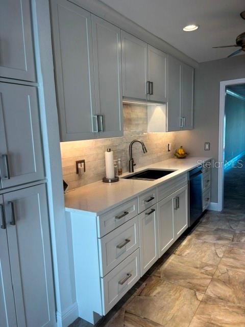 457 Boca Ciega Point Boulevard North St. Petersburg, FL 33708 - Photo 6 of 13 a kitchen with cabinets appliances and a sink