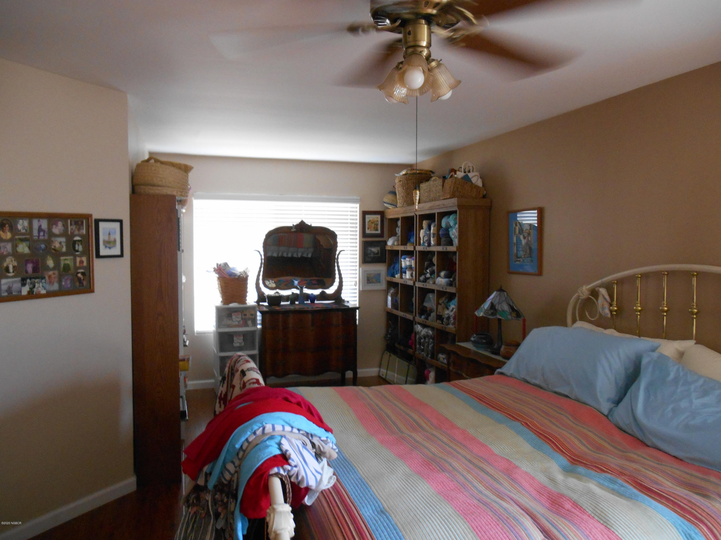 3941 Mesa Cir Drive Lompoc, CA 93436 - Photo 14 of 16 a bedroom with a bed and a flat screen tv
