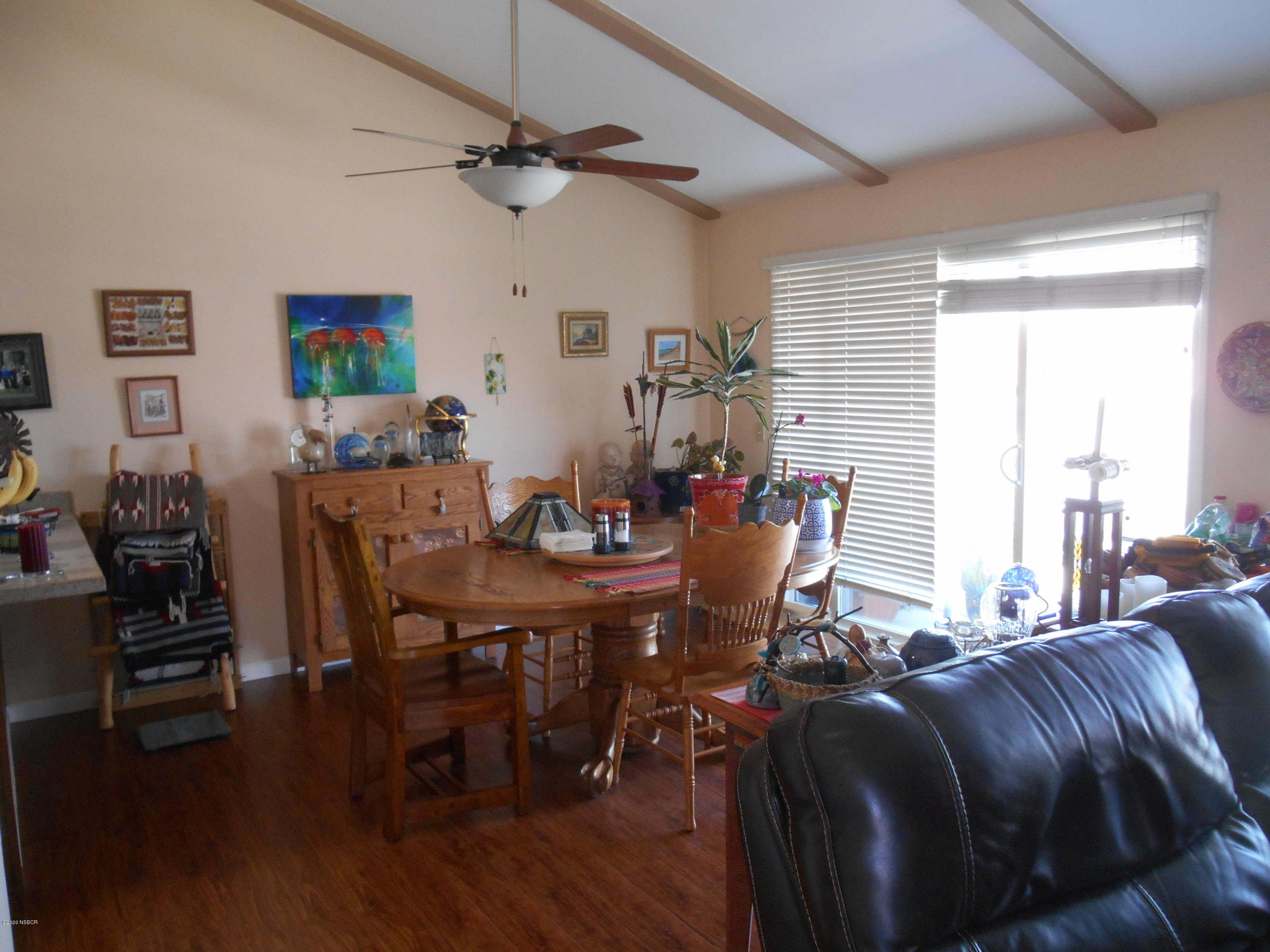 3941 Mesa Cir Drive Lompoc, CA 93436 - Photo 9 of 16 a view of a dining room with furniture and wooden floor