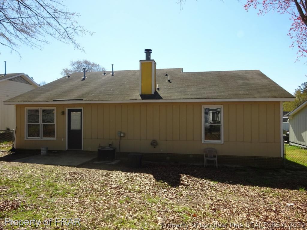 6528 Applewhite Road Fayetteville, NC 28304 - Photo 14 of 15 a front view of a house with a yard