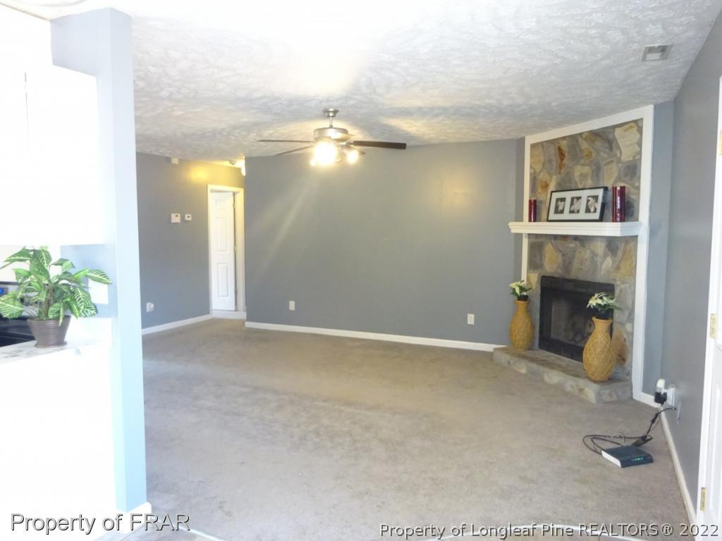 6528 Applewhite Road Fayetteville, NC 28304 - Photo 3 of 15 a view of empty room with painted walls