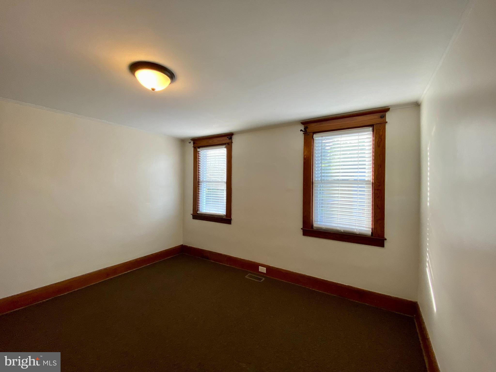 7003 Linden Avenue Baltimore, MD 21206 - Photo 18 of 29 an empty room with a window