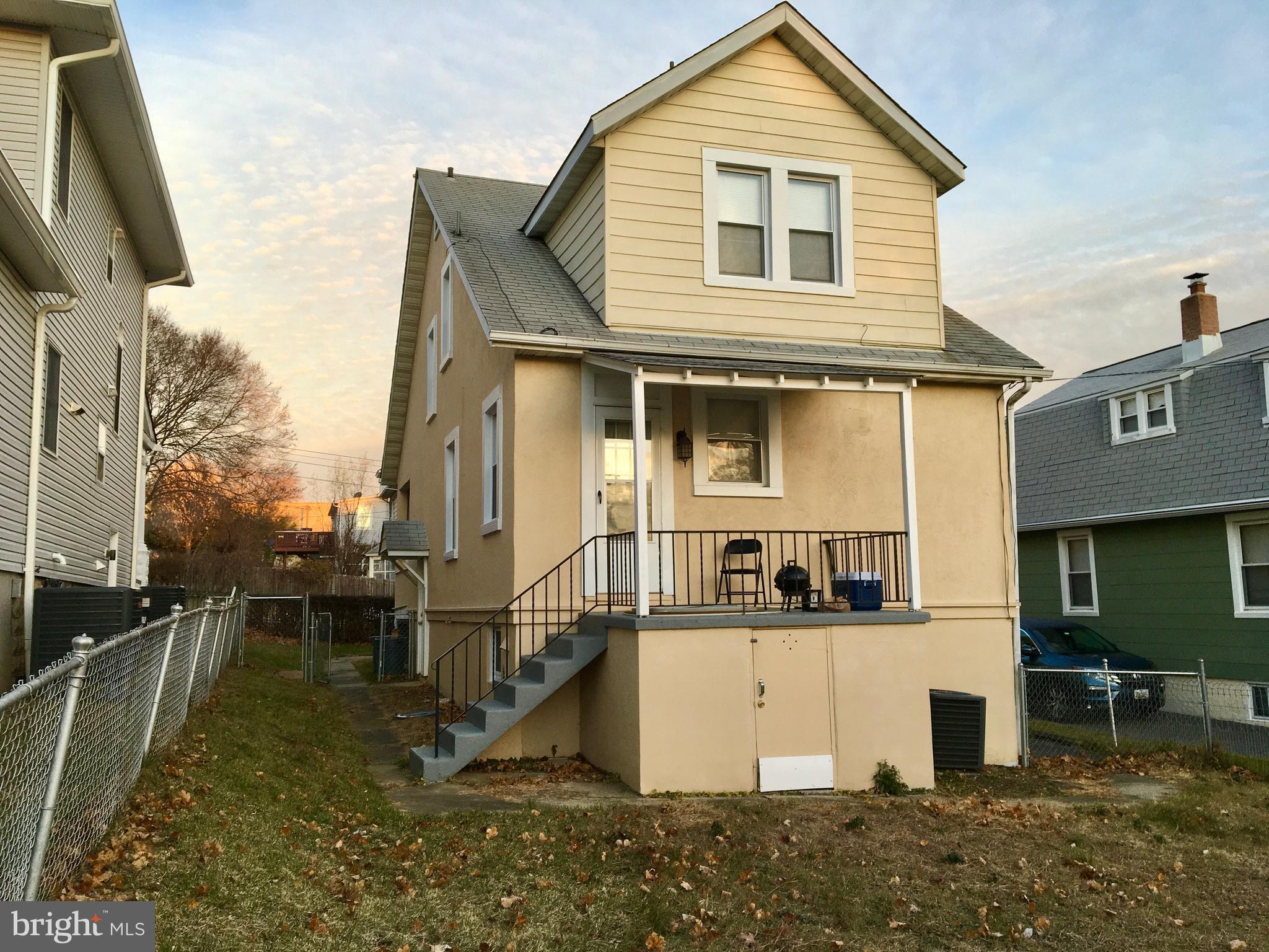7003 Linden Avenue Baltimore, MD 21206 - Photo 3 of 29 a view of a white house next to a yard