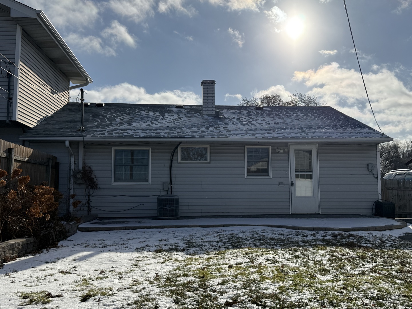 9060 South Main Street Hometown, IL 60456 - Photo 2 of 18 a view of a house with a backyard