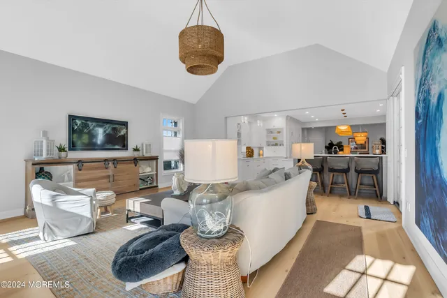 a bathroom with a toilet a sink and a mirror