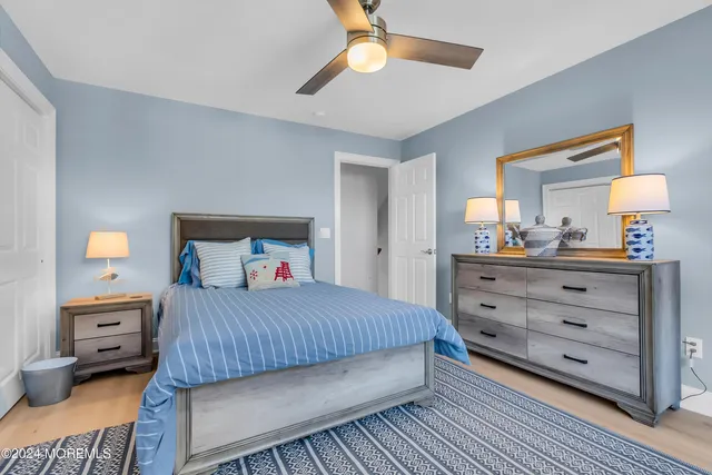 a bathroom with a granite countertop shower and a sink