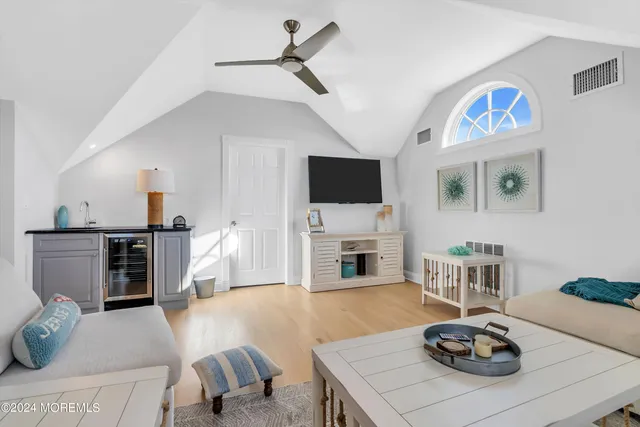 a kitchen with stainless steel appliances granite countertop a stove and a refrigerator
