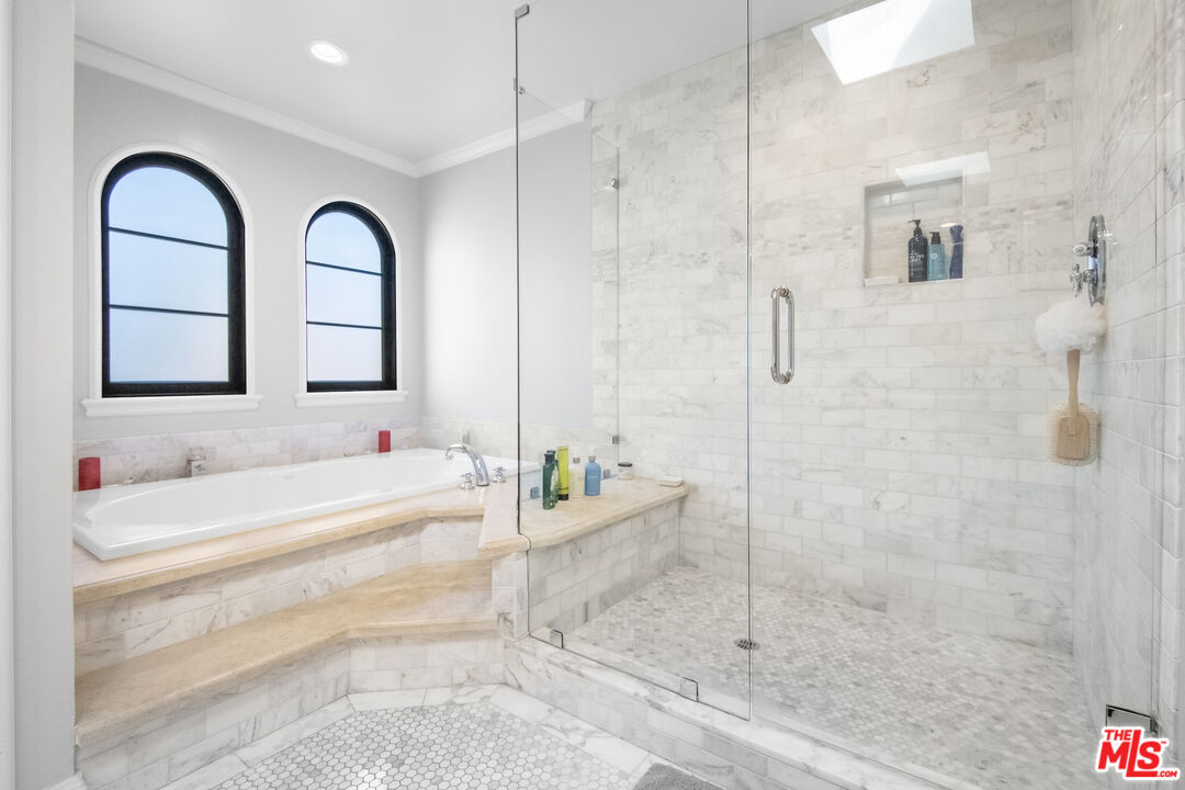 10353 Mississippi Avenue Los Angeles, CA 90025 - Photo 11 of 18 a bathroom with a granite countertop sink mirror and shower