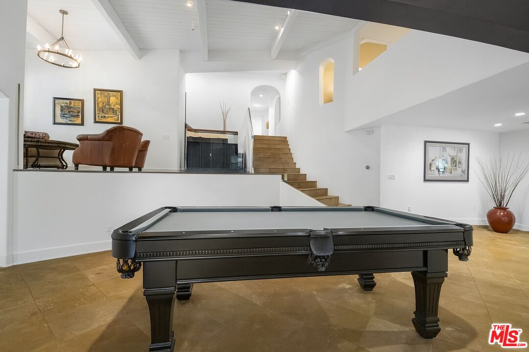 10353 Mississippi Avenue Los Angeles, CA 90025 - Photo 8 of 18 a room with pool table and windows