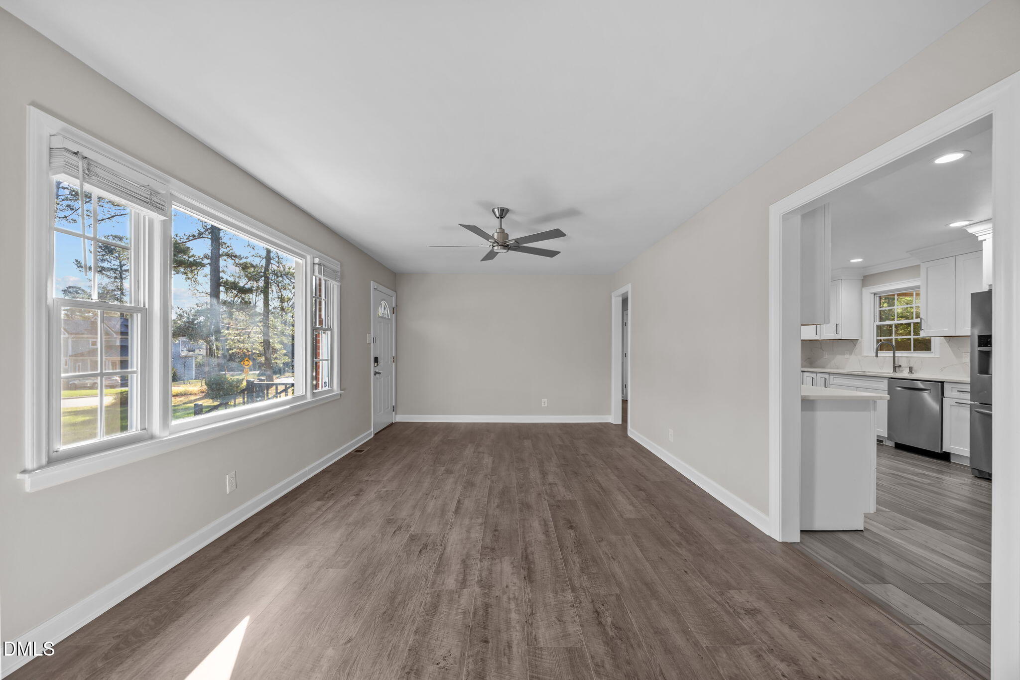 3009 Kenan Road Durham, NC 27704 - Photo 11 of 24 a view of a kitchen with wooden floor and a kitchen