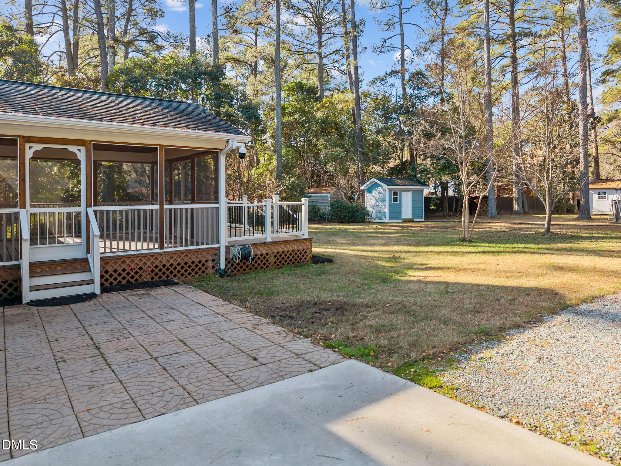 3009 Kenan Road Durham, NC 27704 - Photo 3 of 24 a view of a house with backyard and trees