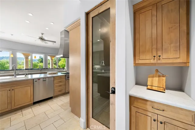 an aerial view of a house with a garden