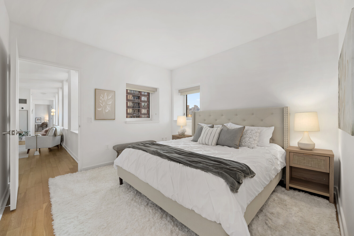 11 East 29th Street, Unit 30B Manhattan, NY 10016 - Photo 5 of 9 a spacious bedroom with a bed and a couch