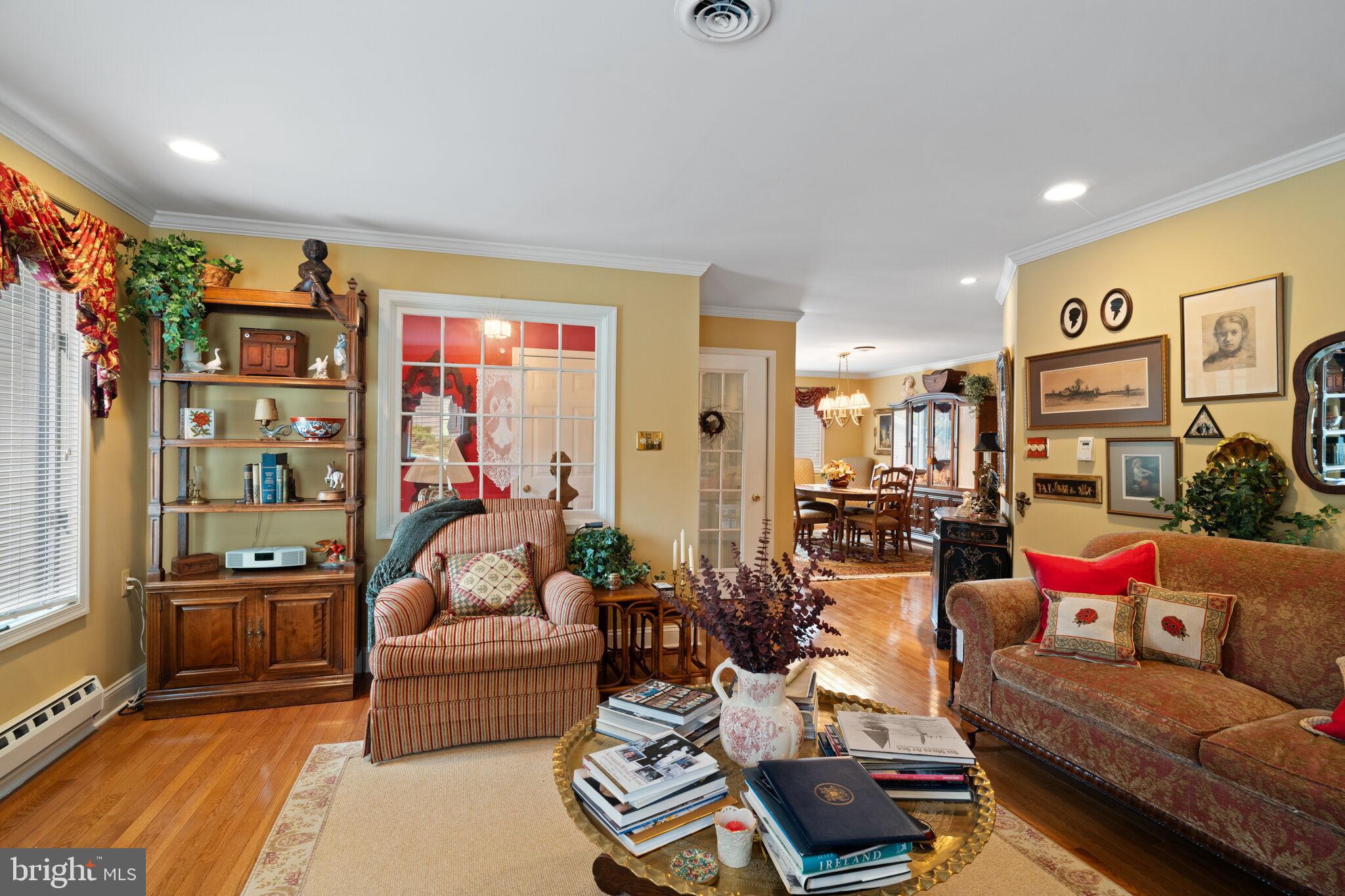 87 Ash Road Manahawkin, NJ 08050 - Photo 11 of 27 a living room with furniture and a flat screen tv