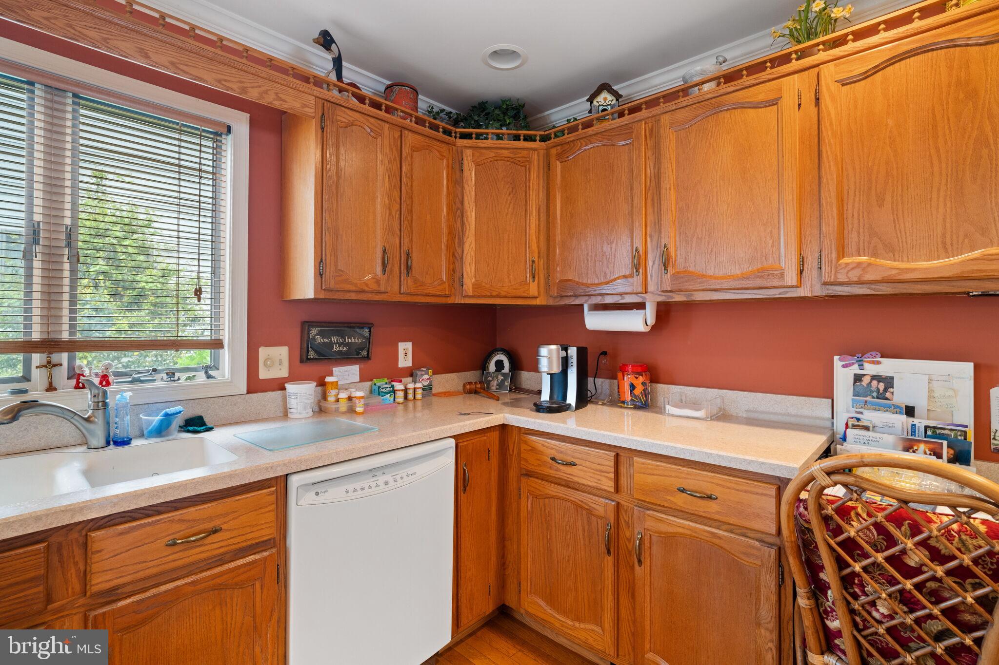 87 Ash Road Manahawkin, NJ 08050 - Photo 15 of 27 a kitchen with a sink and cabinets