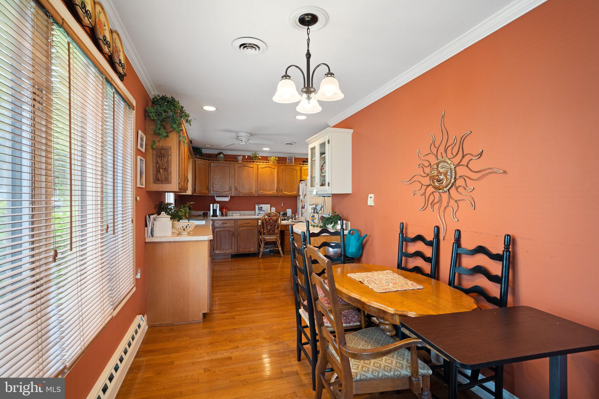 87 Ash Road Manahawkin, NJ 08050 - Photo 19 of 27 a view of a dining room with furniture window and wooden floor